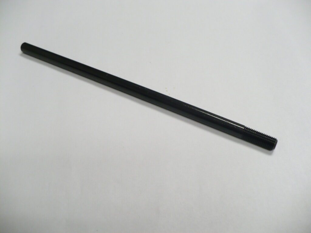 A long black Shaft Envelope Holddown